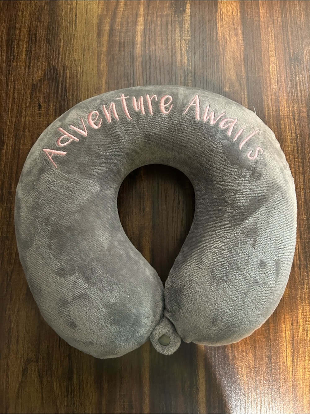 Grey Travel Neck Pillow with Pink 'Adventure Awaits' Embroidery